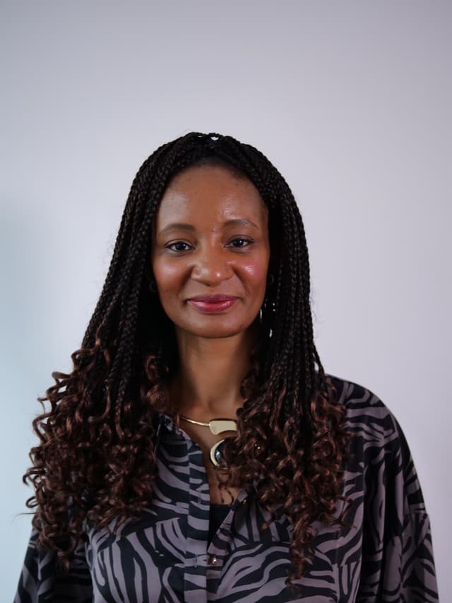 Dr Esther Cole